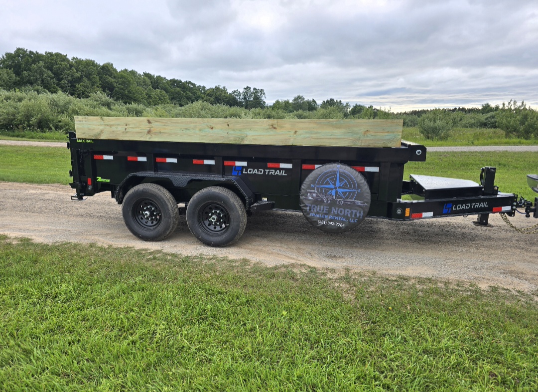 True North Trailer Rental dump trailer parked on a job site in Interlochen, Michigan