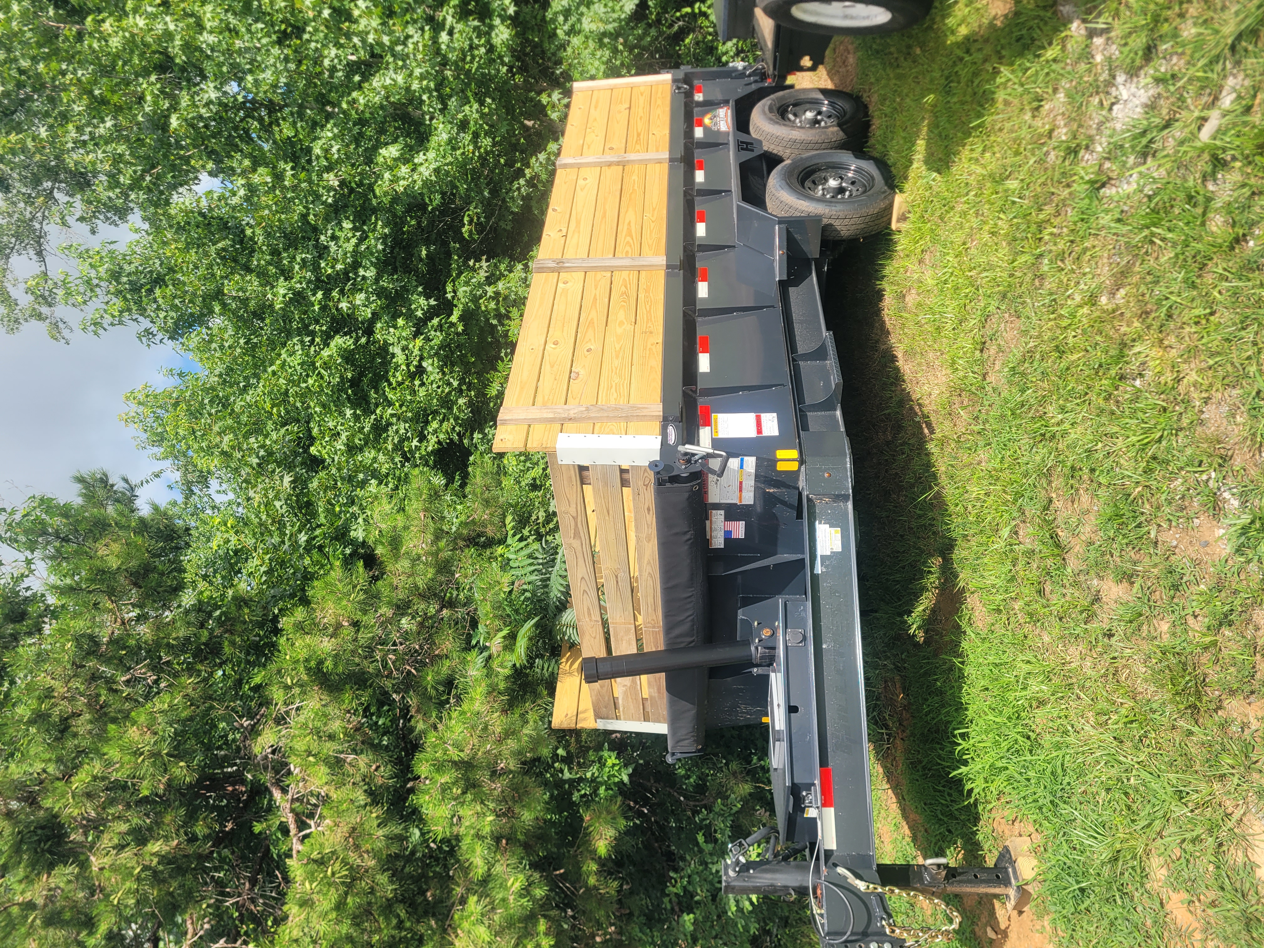 Dump trailer rental near Danville VA and Pelham NC — Hook & Haul 7x14 hydraulic dump trailer for landscaping and construction