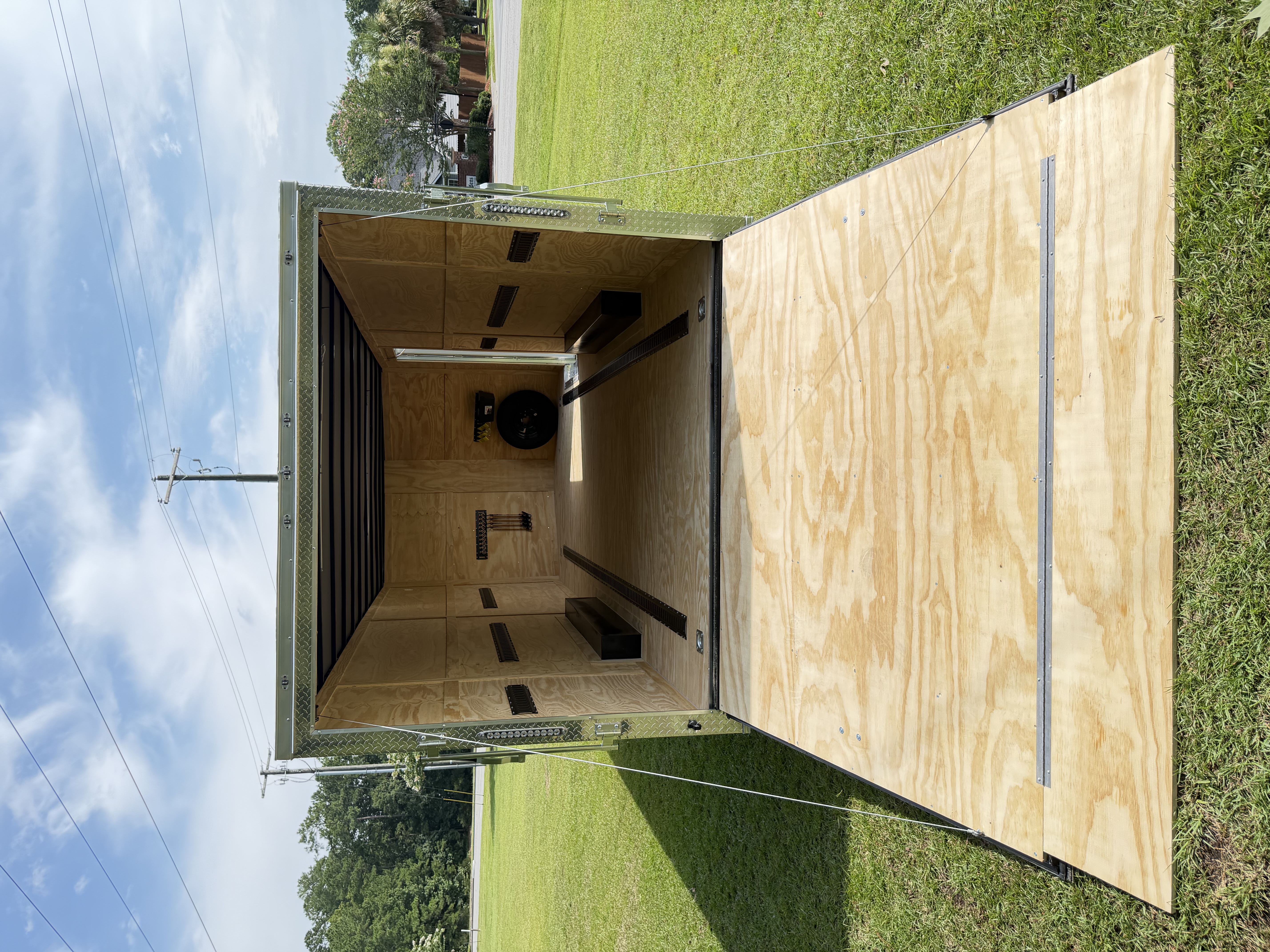 Enclosed trailer side door