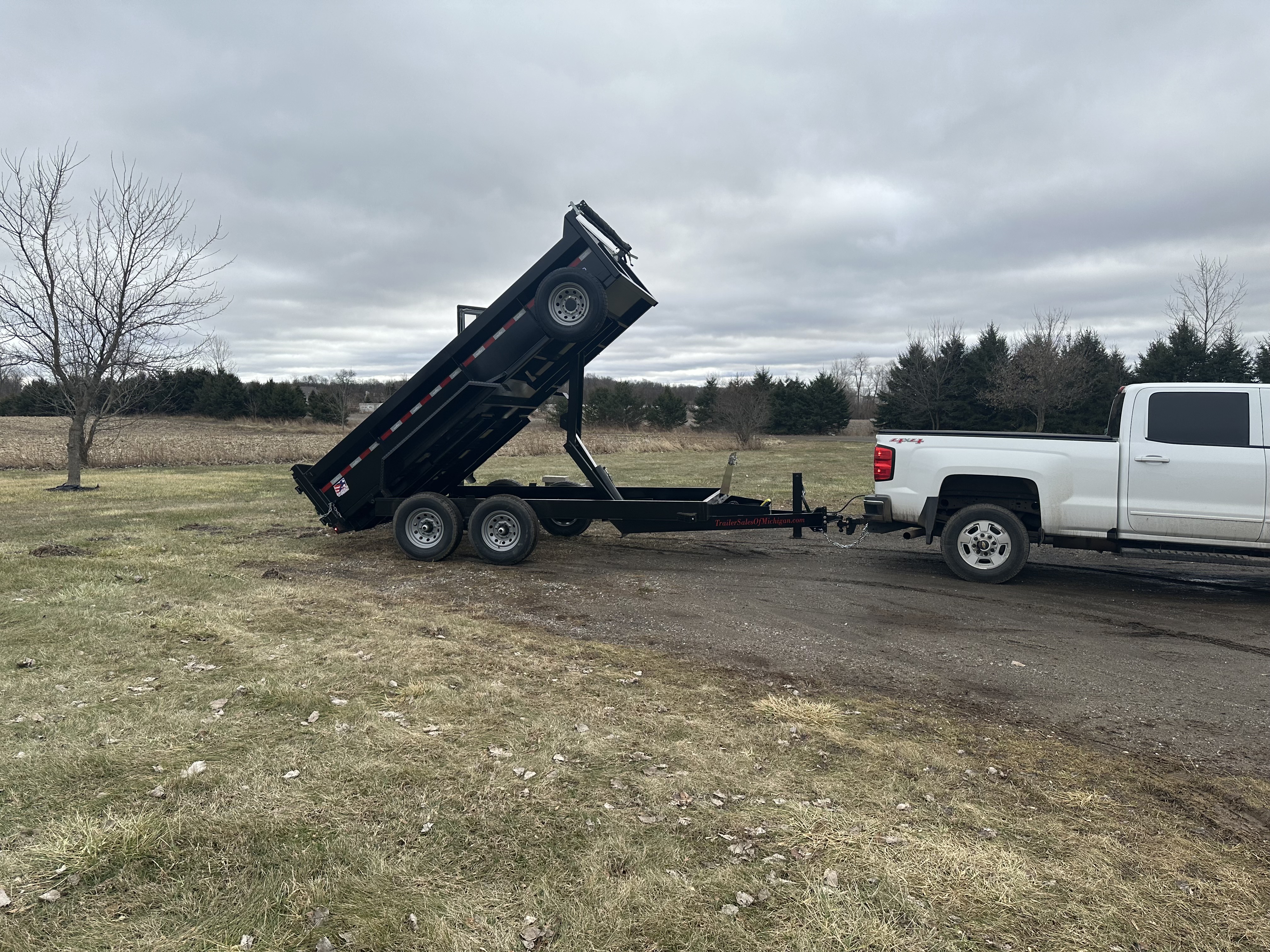 83" x 14' dump trailer for rent in Eaton Rapids MI — ideal for landscaping and construction