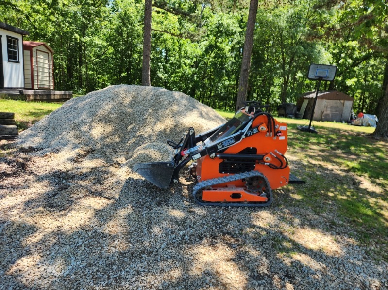 Mini skid steer unit 1 outdoor view